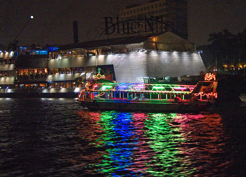 Cairo Nile at Night 7009EG07JHP 
 Cairo Egypt River Nile cruise reflections water night excursion tour is one of the special additional tours on offer during a visit to Cairo is an evening dinner with traditional music and dancing as entertainment on a River Nile cruiseboat cruising past the city lights and major riverside commercial buildings and offices. 
 Keywords: Egypt, Egyptian, River Nile, Cairo, holiday, cruiseboat, cruiseboats, water, sailing, night, riverside, city, buildings, lights, landscape, entertainment, package, tourists, tourism, colours, colors, colourful, colorful, Blue Nile, restuarants, floating