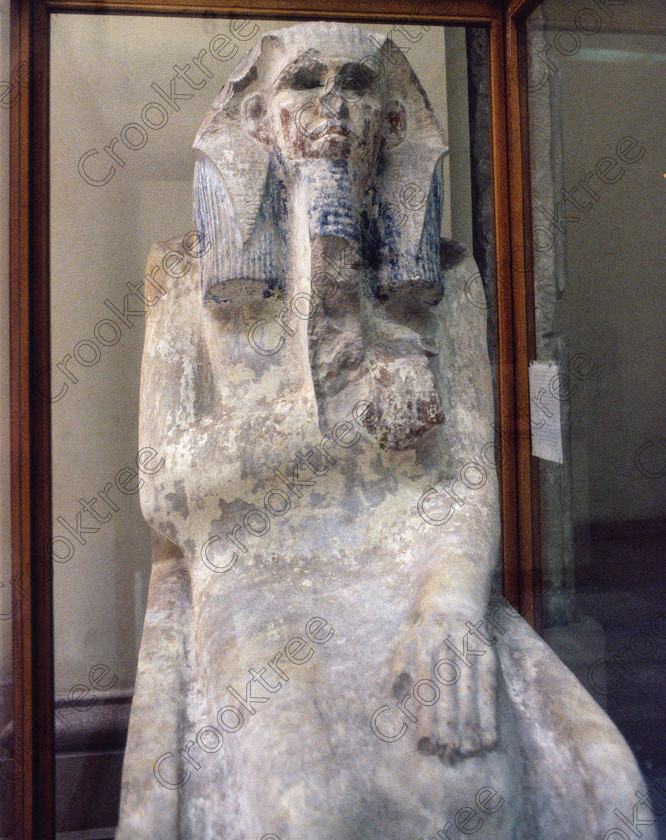 King Doser EG11836JHP 
 Egyptian Museum Exhibit statue King Doser missing eyes serdab Saqqara and now in the prime antiquities collection in Cairo taken during visits between 1994 and 1996 when photography was allowed albeit without flash and tripod. None is of studio quality, being handheld with existing, usually extremely poor light and using slide film, pushed Fuji 400asa to get a suitable aperture and shutter speed. Most of the photos are from the Tutankahum exhibits while the rest are items that interested me as I explored this wonderful and extensive collection, requiring many more hours if not days and is only hinted at during the usual one or two hour visit made on a package tour. 
 Keywords: Egypt, Cairo, Egyptian, Museum, King, Doser, Djoser, Saqqara, serdab, eyes, missing, ground, floor, collection, upright, ancient, antiquity, antiquities, exhibit