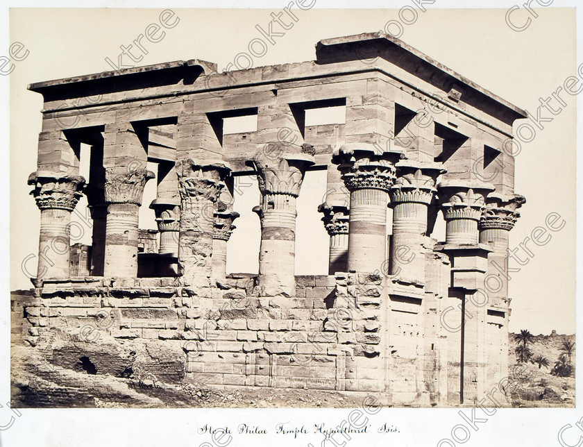 Beato Kiosk of Trajan 32JHP05 
 Roman Kiosk Trajan Philae Temple Egypt Beato Old Photograph Albumen Print on its original island in the River Nile, dedicated to the Goddess Isis and here photographed by Antonio Beato, a Victorian photographer around 1890 and this copy is taken from his album called The Nile 1872. 
 Keywords: Egypt, Aswan, Nubia, River Nile, Philae, Temple, KIosk, Trajan, Pharaoh's Bed, capitals, floral, papyrus, Island, water, history, antiquity, Egyptian, ancient, archaeology, Egyptology, landscape, Antonio Beato, Victorian, photographer, earliest, albumen, print, copy