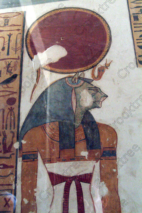 Valley Kings EG0213043jhp 
 Valley Kings Egyptian Tomb Prince Mentuherkhepshef Sekhmet painting solar ureaus colours was son of Ramasses 1X, but his tomb was unfinished but has some excellent colourful depictions of the important ancient Egyptian Gods and although protected by Perspex panels, the custodian was very helpful and slid them back for me to take photographs in 2002 when it was still allowed. Thanks to the capability of the modern digital camera, the first and only chance I have had to use one, a Fuji S2 as photography is now banned in the Valley of Kings per se and especially in the tombs. Adjustments in Photoshop give the chance of reasonably accurate colours even when the tomb paintings were lit by low level artificial light when tripods and flash were not allowed; what could I get with a Nikon F700 and a tripod, which were allowed at one time as well. 
 Keywords: Egypt, Luxor, West Bank, Thebes, Theban, Valley Kings, prince, tomb, KV19, Montu, Mentuherkhepshef, Montu-hir-Khopshef, Sekhmet, Sakhmet, Goddess, lioness, solar, disk, ureaus, upright, paintings, colourful, colorful, colours, colors, bright, white, plaster, ancient, Egyptian, archaeology, Egyptology, hieroglyphics, death, burial, mythology, afterlife, history, hieroglyphs, Gods, offering, fruit, flowers, wine, grapes, bread, DSLR, Fuji, S2, handheld, artificial, light, Photoshop, adjusted, corrections, Perspex, screens