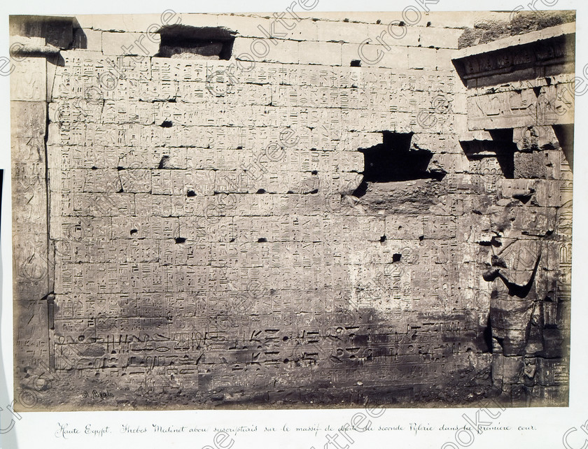 Beato Medinet Habu 13JHP05 
 Medinet Habu Wall Carvings First Courtyard Beato Old Photo Albumen Print taken in Victorian times of this site on West Bank of River Nile at Luxor photographed by Antonio Beato, a Victorian photographer around 1890 and this copy is taken from his album called The Nile 1872. 
 Keywords: Egypt, Luxor, Thebes, River Nile, West Bank, Medinet Habu, temple, courtyard, wall, carvings, ancient, history archaeology ancient Egyptian Egyptology, Antonio Beato, Victorian, 1890, photographer, albumen, print, copy