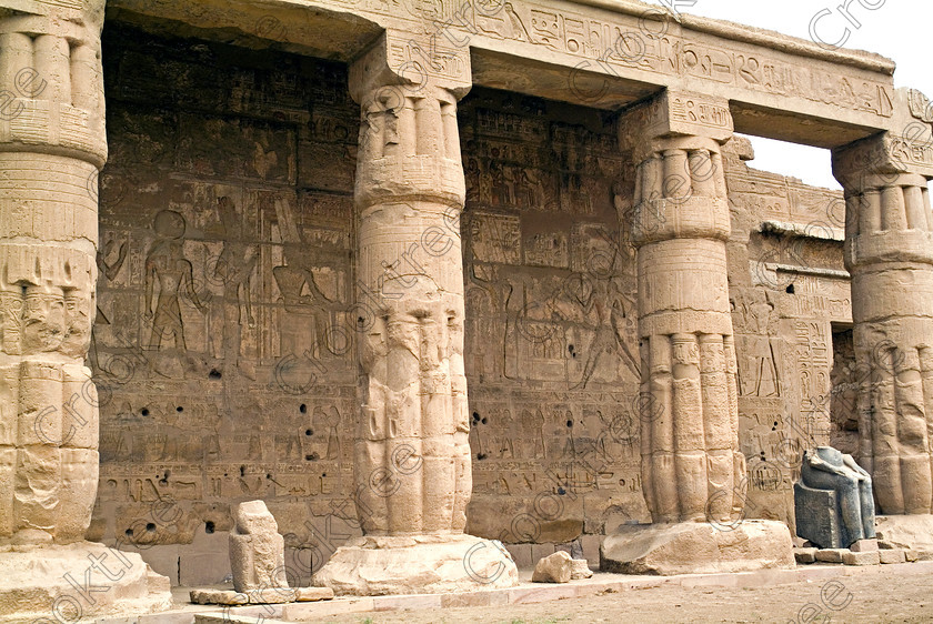 Seti 1 Temple EG053407JHP 
 Goorneh Temple Sethos Columns Papyrus Front Carvings Facade West Bank of the River Nile at Luxor in an area called al-Tarif turning off eastwards instead of taking the Valley of the Kings road. Attributed to Seti it had involvement by Ramasses 1 and 11 and with recent restoration is a delightful extra addition should you have free time while in Luxor and described in the early days as Goorneh Temple. 
 Keywords: Egypt, Luxor, Thebes, River Nile, West Bank, Tarif, village, Temple, Sethos, Seti, Sety, Ramses, mortuary, Dra Abu el-Naga, Qurna, Goorneh, landscape, portico, columns, bud, papyrus, statue, granite, hieroglyphs, cartouche, Horus, Amun, sandstone, wall, reliefs, bas, painted, coloured, colours, colors, history, archaeology, ancient, Egyptian, Egyptology, decorated