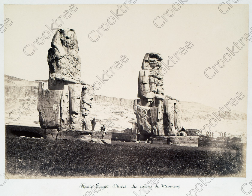 Beato Colossi of Memnon 17JHP05 
 Colossi Memnon Statues Pharaoh Amenhotep Thebes Beato Old Photo Albumen Print situated on the West Bank of River Nile at Luxor photographed by Antonio Beato, a Victorian photographer around 1890 and this copy is taken from his album called The Nile 1872. It is little changed from the modern situation as seen in identical viewpoints in the modern Gallery although there is perhaps a little more vegetation and agricultural development in the background. 
 Keywords: Egypt, Luxor, Thebes, River Nile, West Bank, Colossi, Memnon, seated, statues, Amenhotep, Amenophis, history, archaeology, ancient, Egyptian, Egyptology, Antonio Beato, 1872, albumen, print, Victorian, photographer, earliest