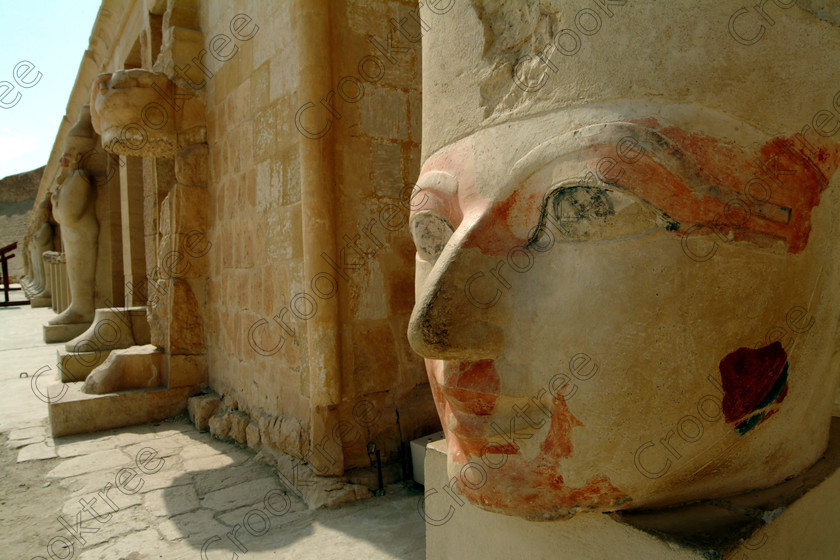 Hatshepsut Temple EG02138JHP 
 Hatshepsut Queen Face Painted Red statue Ancient Egyptian Ruler Upper or central court was opened again in 2002 and makes the visit to this magificent temple almost complete except that entrance into the burial chmaber itself is restricted. This magnificent mortuary temple is located on the West Bank of the River Nile at Luxor at an area called Deir el-Bahri and built into the base of the cliffs of the Theban Hill behind which are branches of the Valley of the Kings. 
 Keywords: Egypt, Luxor, Thebes, Theban, West Bank, Deir el-Bahri, el-Bahari, Dayr, Hatshepsut, mortuary, Temple, landscape, upper, terrace, head, face, painted, red, colours, colors, statues, archaeology, ancient, Egyptian, history, Egyptology, Consort, Queen, Pharaoh, Royal, ruler, woman, columns, hall