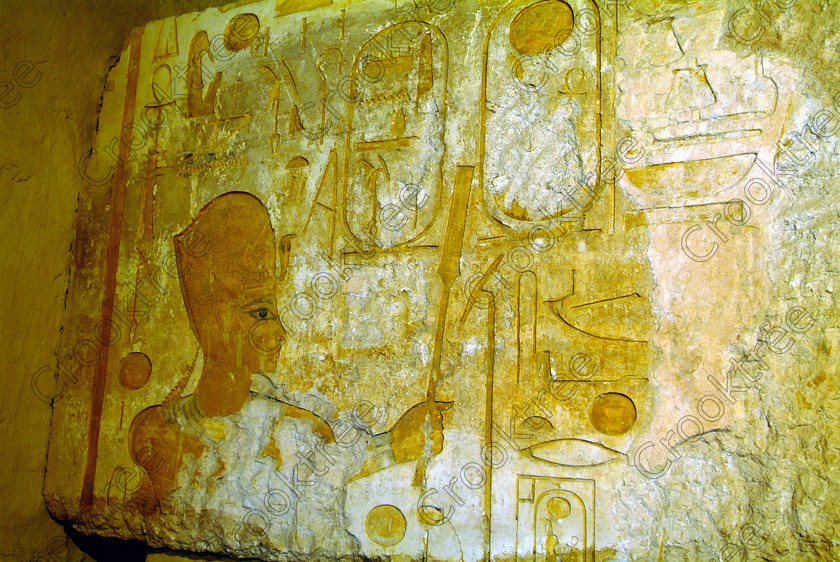 Merneptah Relief EG051904JHP 
 Temple Merenptah Interior Wall Relief Khepresh Staff Cartouche Was Scepter of an Egyptian Pharaoh who reigned around 1212-1202BC, is on the West Bank of the Nile at Luxor and was recently opened not long before these photos were taken in 2005. It is a mixture of open air and covered museum exhibits with some remains of the temple area with column bases. Some of the coloured wall reliefs are exquisite and because of the natural light available were easily photographed despite being inside. There is also a replica of the famous Israeli Stele, the original being in the Cairo Museum. This is a visit that would have to made outwith the usual West Bank package tour although easily arranged and is easily found next to the Ramasseum. 
 Keywords: Egypt, Luxor, Thebes, West Bank, River Nile, temple, Merneptah, Merenptah, pharaoh, 1212BC, landscape, history, ancient, Egyptian, antiquity, archaeology, Egyptology, restoration, wall, reliefs, paintings, blue, crown, khepresh, sekhem, scepter, was, colourful, colorful, colours, colors, hieroglyphs, cartouche