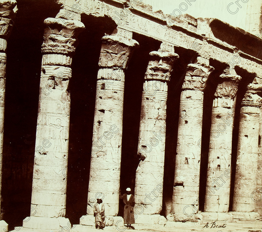 Beato Edfu Temple 8394VQJHP 
 Edfu Anicent Egyptian Temple Colonnade Beato Photograph Albumen Print is at a site located by the River Nile and is one of the main visits for most Luxor to Aswan cruise packages. One of the best preserved temples in Egypt this one is dedicated to the falcon God Horus and his granite likeness is probably one of the most photographed relicts in Egypt and was photographed by Antonio Beato, a Victorian photographer probably around 1870. 
 Keywords: Egypt, Egyptian, Edfu Temple, West Bank, River Nile, history, archaeology, ancient, Egyptology, temple, colonnade, guide, columns, floral, capitals, preserved, Horus, Ptolemaic, landscape, Antonio Beato, 1872, albumen, print, Victorian, photographer, earliest