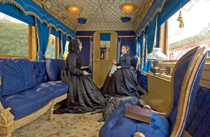 Ballater Royal Carriage VS2822JHP 
 Queen Victorian Royal Railway Carriage Interior Photograph Ballater Lady Waiting in the museum in the Old Railway Station on Royal Deeside in Aberdeenshire 
 Keywords: Scotland, Scottish, Aberdeenshire, Royal Deeside, Ballater, old, station, museum, display, Victorian, Royal, carriage, Queen Victoria, restored, exhibition, history, Balmoral, castle, porter, displays, landscape, colourful, colorful, coloured, colored