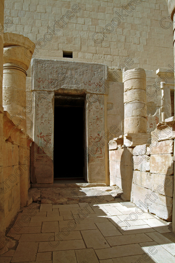 Hatshepsut Temple EG02123JHP 
 Hatshepsut Egyptian Temple Sanctuary Entrance Restricted columns door painted jams seen from the Upper or central court was opened again in 2002 and makes the visit to this magificent temple almost complete except that entrance into the burial chmaber itself is restricted, although this view is possible from the gates. This magnificent mortuary temple is located on the West Bank of the River Nile at Luxor at an area called Deir el-Bahri and built into the base of the cliffs of the Theban Hill behind which are branches of the Valley of the Kings. 
 Keywords: Egypt, Luxor, Thebes, Theban, West Bank, Deir el-Bahri, el-Bahari, Dayr, Hatshepsut, mortuary, Temple, upright, upper, central, court, burial, chamber, entrance, archaeology, ancient, Egyptian, history, Egyptology, Consort, Queen, Pharaoh, Royal, ruler, woman, columns