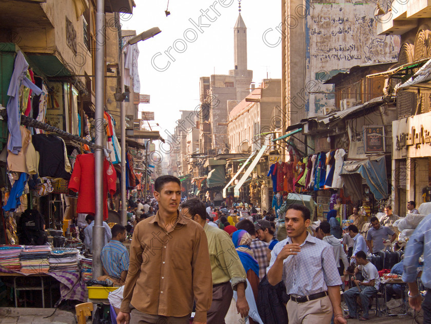 Cairo Khan al-Kalili EG072616jhp 
 Egypt Cairo Kan al-Khalili souk Egyptians shopping crowded throng people a busy and often important site seeing stop-off for tourists to Egypt and offered as part of City Tour where many bargains can be picked up as part of that exotic shopping experience in an Arabic Bazaar. Bargaining is also part of the fun and is expected throughout so a new and often daunting experience for the traditional conservative British visitor. Better value can probably be obtained in Aswan or Luxor and certainly for those doing a Nile Cruise large, weighty or fragile items are best left to the last minute. 
 Keywords: Egypt, Egyptians, Cairo, cruise Arabic, landscape, capital, old, city, gates, Sultan, Qansuh, Fatimid, Kan al-Khalili, al-Kalili, souk, street, scene, modern, busy, crowded, locals, shopping, throng, al-Badestan, maze, alleyways, alleys, shops, factories, bazaars, market, antiques, gold, jewellery, clothes, glass, leather, metal, wood, crafts, souvenirs, cafes, restaurants, sheeshas, trade, commercial, mosques, minaret, palm, trees, architecture, al-Azhar, Maydan, square, al-Hussein, Sayyidna, al-Husayn, building, 19C, Gothic