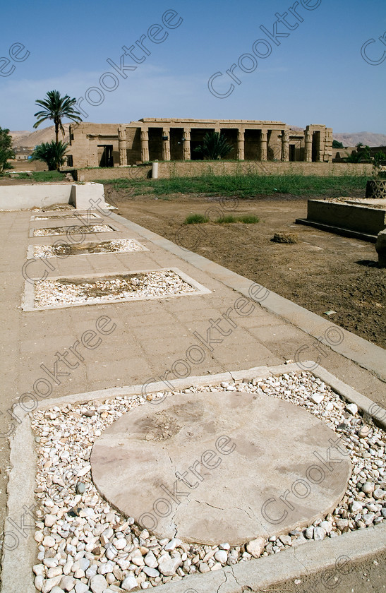 Seti 1 Temple EG053342JHP 
 Temple Seti 1 Vista Portico Column Bases Courtyard Restoration Photo Egypt on the West Bank of the River Nile at Luxor in an area called al-Tarif turning off eastwards instead of taking the Valley of the Kings road. Attributed to Seti it had involvement by Ramasses 1 and 11 and with recent restoration is a delightful extra addition should you have free time while in Luxor and described in the early days as Goorneh Temple. 
 Keywords: Egypt, Luxor, Thebes, River Nile, West Bank, Tarif, village, Temple, Sethos, Seti, Sety, Ramses, mortuary, Dra Abu el-Naga, Qurna, Goorneh, upright, first, court, column, bases, necropolis, sandstone, wall, floor, restored, history, archaeology, ancient, Egyptian, Egyptology, decorated