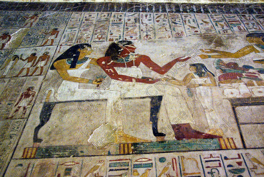 Rekhmire Tomb Painting EG075688JHP 
 Rekhmire Tomb Painting Vizier Wife Offering Interior Photo Luxor Egypt, one of many beautiful tomb decorations amongst the Tombs of the Nobles on the West Bank of the River Nile at Luxor. Rekhmire Tomb-Chapel [Tomb 100] was a Vizier during the reigns of Tuthmosis 11 and Amenhotep 11, part of a family with long service as administrators at Thebes. This highly decorated cruciform tomb is full images giving great understanding of Egyptian foreign policy, taxation and the justice system. The area around the Tombs has now been greatly improved with removal of many of the old modern houses and entry to these fascinating burial sites made more accessible. 
 Keywords: Egypt, Egyptian, ancient, Luxor, Tombs, Nobles, Thebes, River Nile, West Bank, Old Qurna, Sheikh Abd’el-Qurna, landscape, Rekhmire, Vizier, administrator, tomb, painting, relatives, exchanging, food, gifts, lotus, flowers, hieroglyphs, colourful, colorful, colours, colors, painted, artificial, light, digital