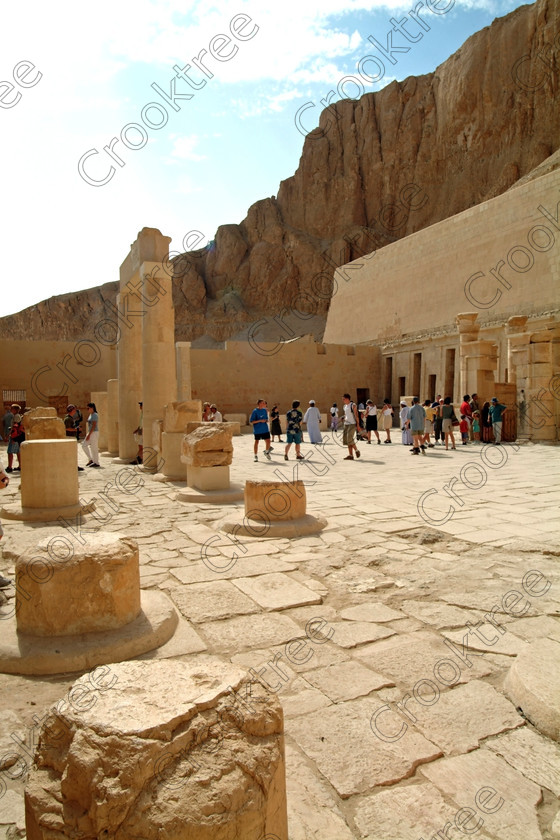 Hatshepsut Temple EG02132JHP 
 Hatshepsut Temple Pharaoh Burial Chamber excavated Luxor Egypt Upper central court was opened again in 2002 and makes the visit to this magificent temple almost complete except that entrance into the burial chmaber itself is restricted. This magnificent mortuary temple is located on the West Bank of the River Nile at Luxor at an area called Deir el-Bahri and built into the base of the cliffs of the Theban Hill behind which are branches of the Valley of the Kings. 
 Keywords: Egypt, Luxor, Thebes, Theban, West Bank, Deir el-Bahri, el-Bahari, Dayr, Hatshepsut, mortuary, Temple, upright, upper, central, court, statues, crowds, visitors, busy, archaeology, ancient, Egyptian, history, Egyptology, Consort, Queen, Pharaoh, Royal, ruler, woman, columns