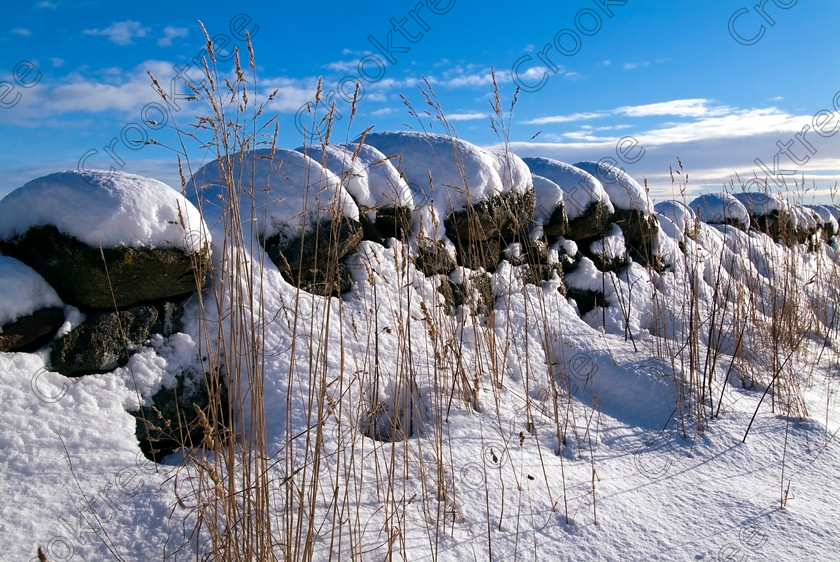 Snowy Field Ordhead TO157032JHP 
 Snow Field Ordhead Dyke Stone Wall Winter Aberdeenshire Scotland in a field just after Ordhead on the Cluny road to Craigearn and Kemnay. 
 Keywords: Scotland, Scottish, Grampian, Aberdeenshire, Mar, Ordhead, landscape, winter, snow, field, dyke, stone, wall, grass