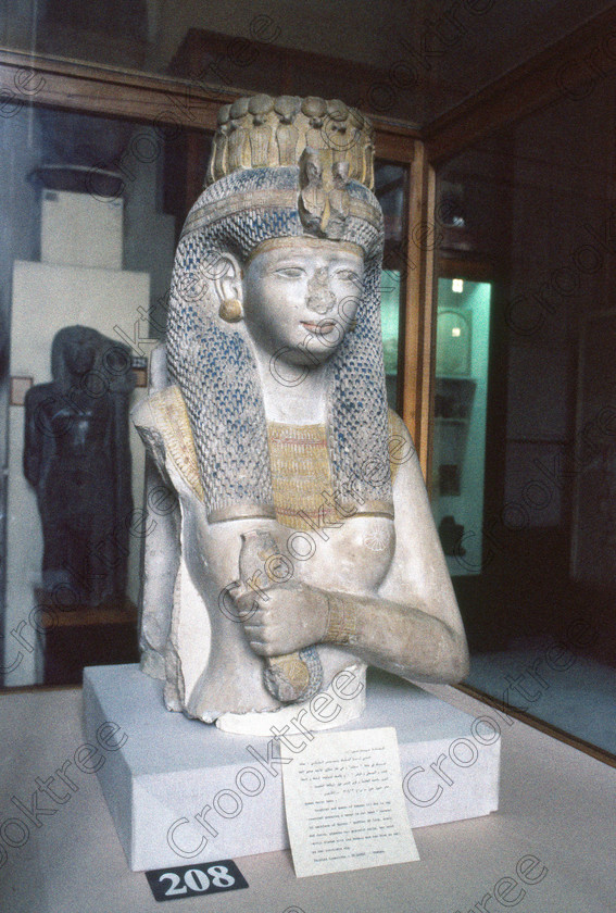 Queen Merit-Amun Bust EG11811JHP 
 Egypt Cairo Museum Exhibit bust Queen Merit-Amun Ramasseum Rameses 11 in the prime antiquities collection in Cairo taken during visits between 1994 and 1996 when photography was allowed albeit without flash and tripod. None is of studio quality, being handheld with existing, usually extremely poor light and using slide film, pushed Fuji 400asa to get a suitable aperture and shutter speed. Most of the photos are from the Tutankahum exhibits while the rest are items that interested me as I explored this wonderful and extensive collection, requiring many more hours if not days and is only hinted at during the usual one or two hour visit made on a package tour. 
 Keywords: Egypt, Cairo, Egyptian, Museum, Merit-Amun, Queen, bust, painted, headdress, uraeus, sun disks, wig, necklace, menat, limestone, Rameses, collection, upright, ancient, antiquity, antiquities, exhibit