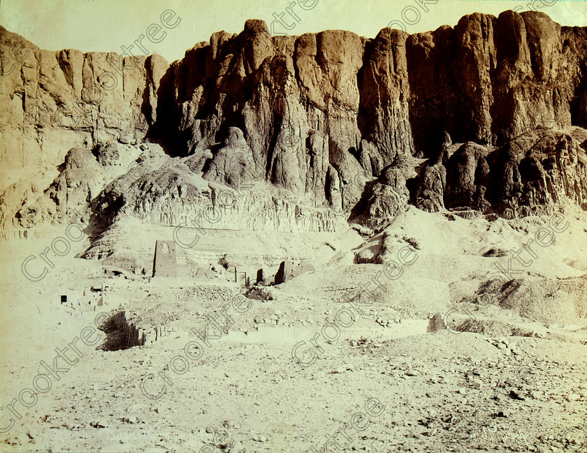 JP Sebah Deir el-Bahri 8414VQJHP 
 Hatshepsut Temple Deir el-Bahri Egypt Thebes Sebah Albument Photograph Print located on the West Bank of the River Nile at Luxor taken by the Turkish photographer J.P.Sebah probably around 1890-1900. This view is taken possibly very low down and much further back than most visitors are aware now as the temple complex built tight under the Theban hills has one of the most spectacular façade’s of any Egyptian monument. 
 Keywords: Egypt, Luxor, Thebes, Theban, hills, River Nile, West Bank, Deir el-Bahri, el-Bahari, Dayr, Hatshepsut, Temple, JP Sebah, photographer, Turkish, 1890, albumen, print, photo, copy, archaeology, ancient, Egyptian, Egyptology, history, landscape