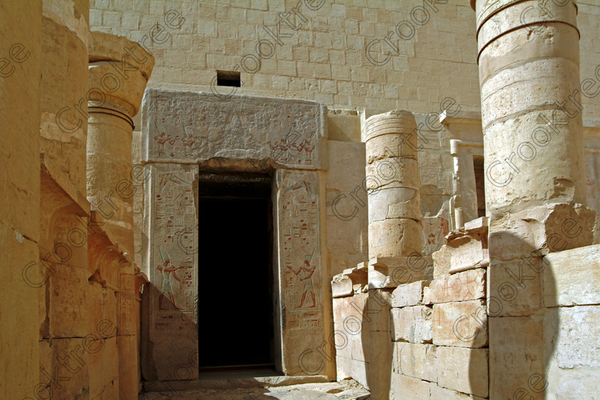 Hatshepsut Temple EG02127JHP 
 Hatshepsut Ancient Egyptian Temple Sanctuary Amun Upper central court photograph was opened again in 2002 and makes the visit to this magificent temple almost complete except that entrance into the burial chmaber itself is restricted. This magnificent mortuary temple is located on the West Bank of the River Nile at Luxor at an area called Deir el-Bahri and built into the base of the cliffs of the Theban Hill behind which are branches of the Valley of the Kings. 
 Keywords: Egypt, Luxor, Thebes, Theban, West Bank, Deir el-Bahri, el-Bahari, Dayr, Hatshepsut, mortuary, Temple, landscape, upper, central, court, burial, chamber, entrance, archaeology, ancient, Egyptian, history, Egyptology, Consort, Queen, Pharaoh, Royal, ruler, woman, columns