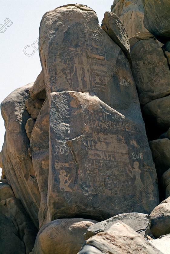 Seheil Rock Carvings EG052620JHP 
 Seheil Island Rock Carvings Nobles Records Aswan River Nile Egypt Boulders cataracts. The main reason for this private excursion by motorboat was to visit the rock carvings which cover this boulder strewn part of the Nile recording many events throughout the ancient history of the Egyptian Empire spanning some 3000 years although most were made in the 18-18 Dynasties. Most were the work of officials, often before they went to Nubia or reporting their efforts on return. The most notable carving is the Ptolemaic Famine Stele which refers to a famine during the reign of Doser, famous for the Step Pyramid at Saqqara, some 2000 years before. 
 Keywords: Egypt, Aswan, River Nile, Nubia, Nubian, Seheil Island, Sehel, rock, carvings, numbered, 206, 208, 209, hieroglyphs, cartouche, Gods, offering, upright, boulders, figures, history, archaeology, Egyptology, antiquity, Egyptian, ancient, officials, reports, projects