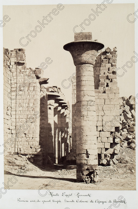Beato Karnak Temple 24JHP05 
 Karnak Temple Hypostyle Hall Taharqa Kiosk Beato Old Photograph Albumen Victorian Print and its one remaining papyrus column at this religious complex on East Bank of River Nile at Luxor photographed by Antonio Beato, a Victorian photographer around 1890 and this copy is taken from his album called The Nile 1872. 
 Keywords: Egypt, Luxor, Thebes, River Nile, East Bank, Karnak Temple, entrance, upright, kiosk, papyrus, column, Taharqa, pylon, hypostyle hall, columns, ancient, history, archaeology, ancient, Egyptian, Egyptology, Antonio Beato, Victorian, 1890, photographer, albumen, copy, print